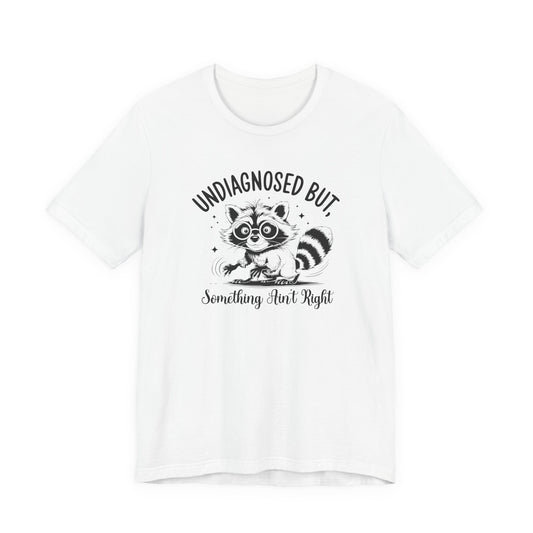 White UNDIAGNOSED BUT Something Ain’t Right Raccoon Autism T Shirt